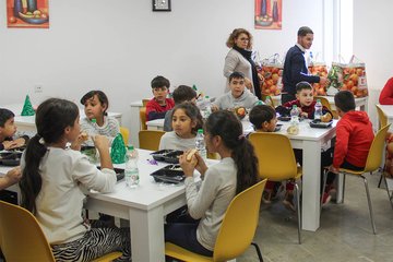 Children eating in Casa Austria - Concordia Social Projects